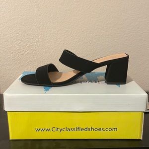 Black high heels with straps